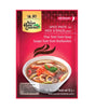 Packaging for Asian Home Gourmet Spice Paste for Thai Tom Yum Soup 50g, with an image of the soup and ingredients listed on the package.