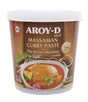 A container of Aroy-D Massaman Curry Paste with an image of the curry on the label, indicating it is a product of Thailand.