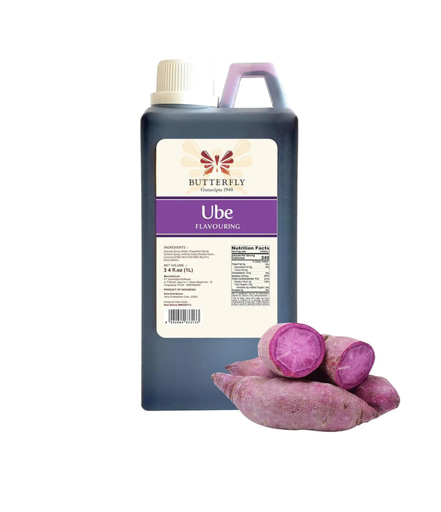 A bottle of Butterfly Ube Flavouring Extract Paste alongside whole purple sweet potatoes.