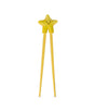 Yellow star-shaped chopstick on a white background