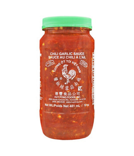 A jar of Huy Fong Foods Chili Garlic Sauce with a red and green label, indicating the flavor of the sauce.
