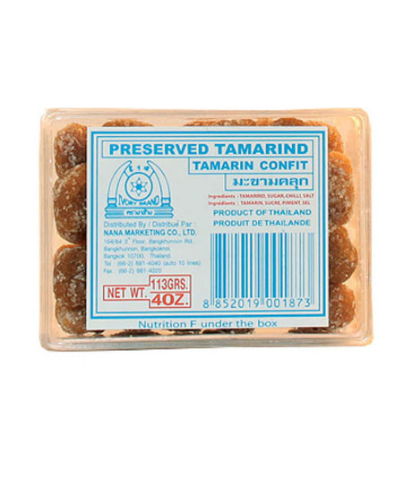 Packaged preserved tamarind (chili) in a clear plastic box with a blue label, indicating it is a product of Thailand.