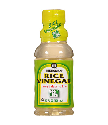 A bottle of Kikkoman Rice Vinegar with a green label and yellow cap, displaying the product name and volume information.