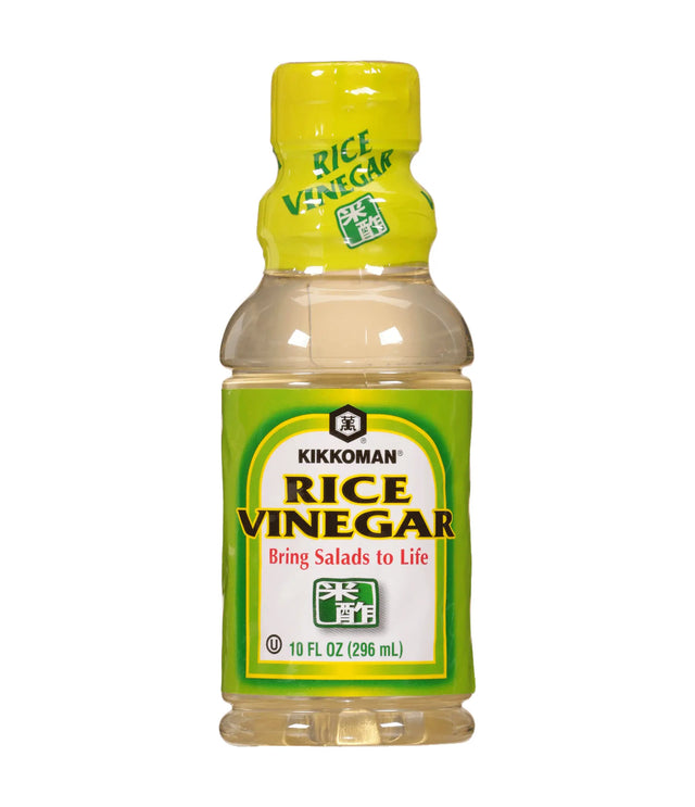 A bottle of Kikkoman Rice Vinegar with a green label and yellow cap, displaying the product name and volume information.