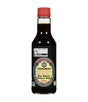 Bottle of Kikkoman soy sauce on a white background