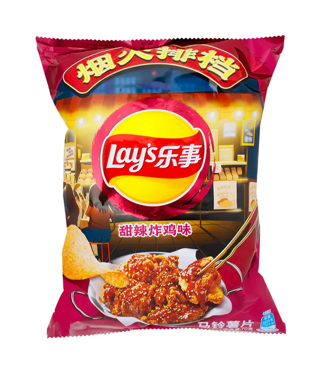 Lay's potato chips packaging with a spicy chicken flavor on a white background