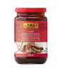 A jar of Lee Kum Kee Char Siu Sauce, 320ml, with a label showing the product name and an image of grilled meat, indicating its use as a marinade sauce.