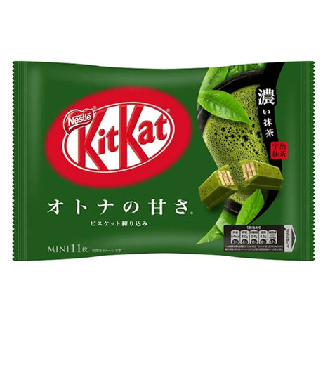 A package of Nestle Kit Kat Chocolate in Green Tea flavor, predominantly green in color with the Kit Kat logo visible.