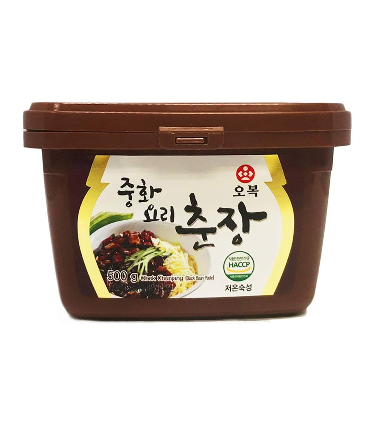 A plastic container of Obok Black Bean Paste (Chunjang) with a label showing the product name and an image of a seasoned dish.