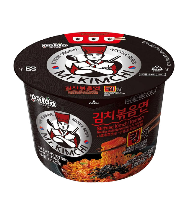 A cup of Paldo Stir-Fried Kimchi Ramen noodles, with packaging that displays the product name and an image of the noodles with kimchi.