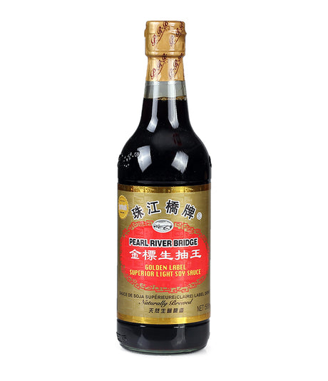 A bottle of Pearl River Bridge Superior Light Soy Sauce with a label indicating it is a product of China.