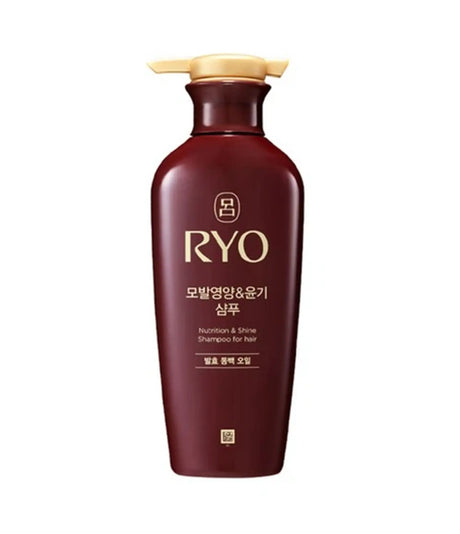 Brown shampoo bottle with gold cap on a white background