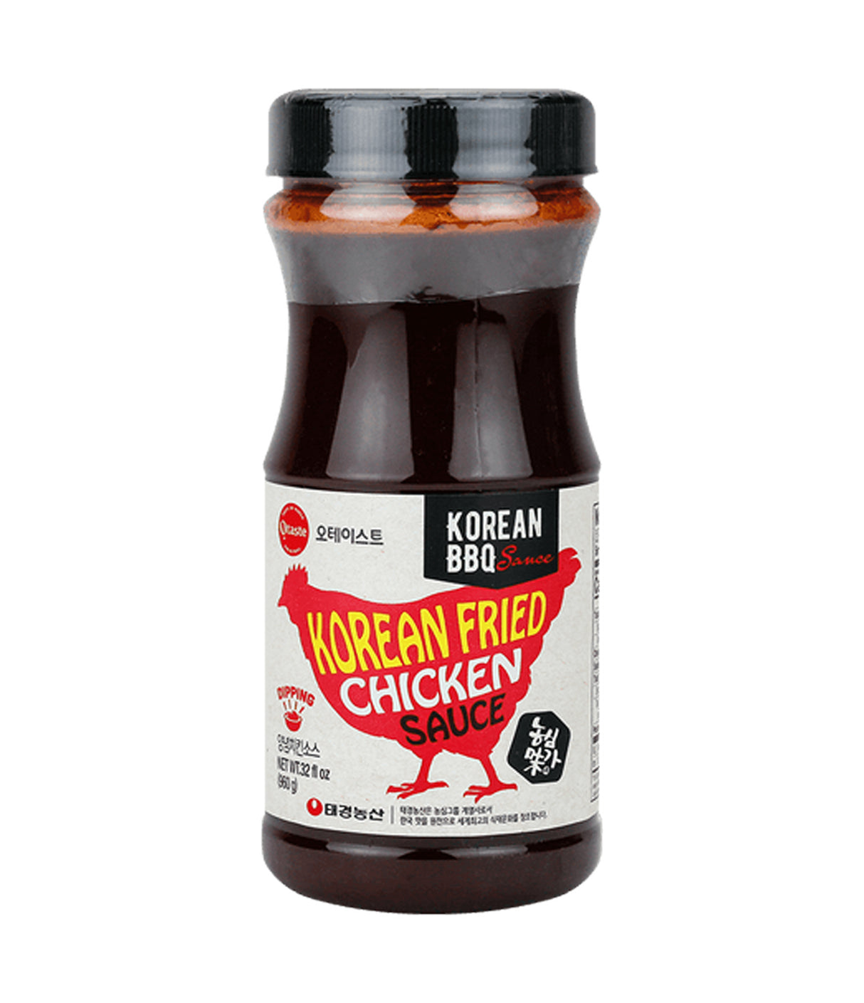 A bottle of Tae Kyung Korean Fried Chicken Sauce with a white and red label, indicating it is a product of Korea.