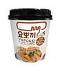 A cup of Young Poong Yopokki Garlic Teriyaki Topokki, showing the product packaging with Korean text and an image of the noodles.