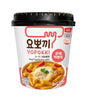 Yopokki instant noodles cup with Korean text and a picture of noodles on a white background