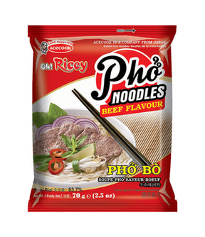 Packaging for Acecook Oh! Ricey Instant Rice Noodles in Beef Flavour. The package is predominantly red with images of the noodles and beef, along with green herbs and a tomato.