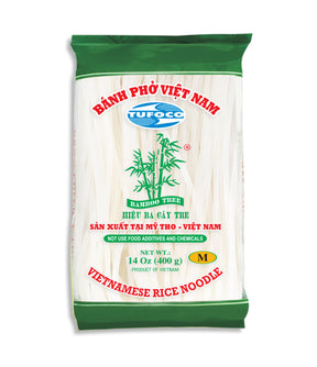 Packaged Vietnamese rice noodles labeled as 'Banh Pho Viet Nam' in a green and white bag.