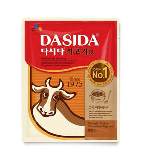 Package of CJ CheilJedang Dasida Beef Flavoured Seasoning 500g, with a graphic of a cow and the number 1 since 1975 indicating it is the number one brand.