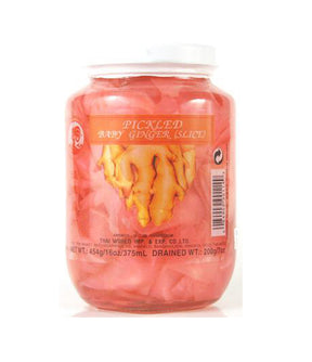 A jar of Cock Brand Pickled Baby Ginger, showing the ginger slices inside the jar and the label on the top.