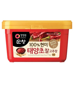 A 1kg container of Daesang Hot Pepper Paste (Gochujang), with a predominantly red label and a yellow lid. The product is displayed against a white background.