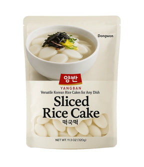 Packaging of sliced rice cake with a bowl of rice cake and soup on a white background