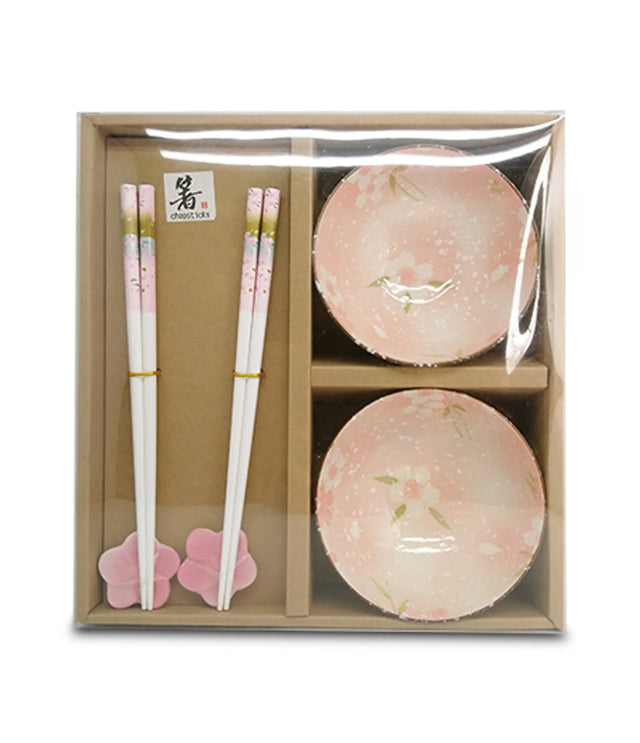 Set of two pink ceramic bowls with chopsticks in a cardboard box