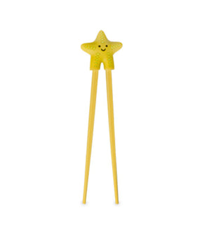 Yellow star-shaped chopstick on a white background