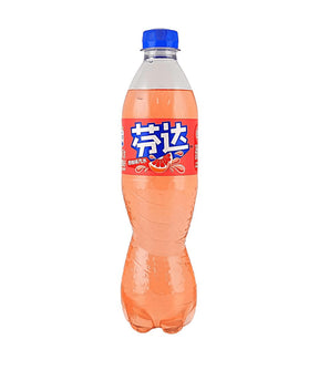 A bottle of Fanta citrus soda in a clear plastic bottle with a blue cap, filled with orange-tinged liquid, and featuring a red label with Chinese branding on a white background.