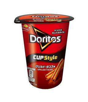 A package of FritoLay's Doritos Cup Style, featuring Grilled Tacos flavor. The packaging is predominantly red with images of the product, which are cylindrical cups containing the Doritos chips.