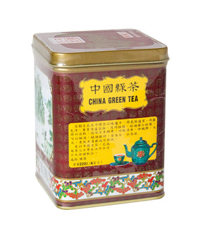 A can of Golden Dragon China Green Tea with decorative elements in red and gold colors, and Chinese characters displayed on the label.