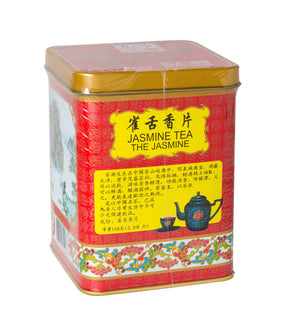 A colorful tin can of Golden Dragon Jasmine Tea with Chinese characters, a picture of a teapot, and a cup on the front.