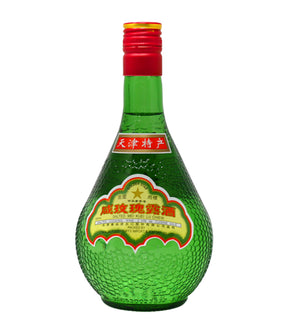 A bottle of Golden Star Salted Cooking Wine with a green tint and label featuring Chinese characters.