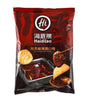 A package of Haidilao Chinese spicy hot pot flavored potato chips, featuring a dark red and black bag with illustrations of chips dipped in red oil.