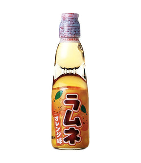 A bottle of Hata Ramune Soda with orange flavor, 200ml, with Japanese text on the label.