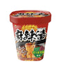 A cup of ISDG Japanese instant noodles, specifically their 'Bitter Hot' (BirrōTakayaki) spicy marinated noodle soup, in a red plastic cup with a detailed label showing noodles and red peppers.