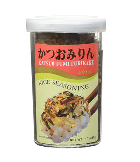 A container of JFC Katsuo Fumi Furikake Rice Seasoning, with a label displaying the product name and an image of seasoned rice.