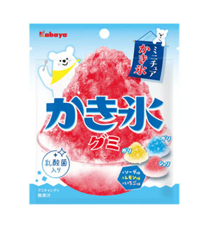 A package of Kabaya Japanese gummy snow cone candy, featuring a large illustration of a pink snow cone with blue Japanese text and cartoon polar bear graphics on a light blue background.