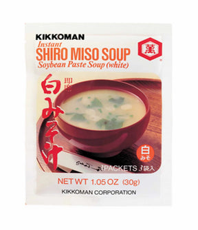 A packet of Kikkoman Instant Shiro Miso Soup, showing an image of a bowl of soup and the ingredients listed on the front.