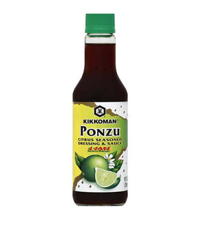 A bottle of Kikkoman Ponzu Citrus Seasoned Dressing & Sauce with the product label showing the brand name, product name, and an image of a lime.