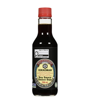 Bottle of Kikkoman soy sauce on a white background