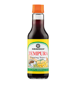 A bottle of Kikkoman Tempura Dipping Sauce with a label showing the product name and the American flag, indicating it is a product of U.S.