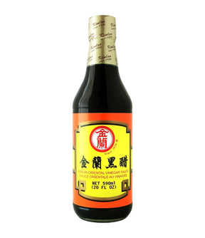 Bottle of Kimlan Oriental Vinegar Sauce with label, predominantly dark colored sauce visible.