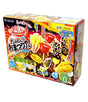 A box of Kracie Popin' Cookin' Candy Kit featuring various candy shapes and Japanese festive elements, predominantly in red, yellow, and black colors.