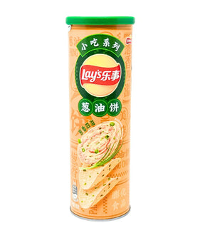 Lay's snack can with green lid on a white background