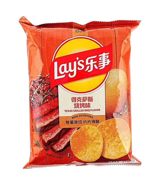 A bag of Lay's Texas Grilled BBQ Flavor Real Potatoes potato chips in its original red packaging with a yellow and red Lay's logo.