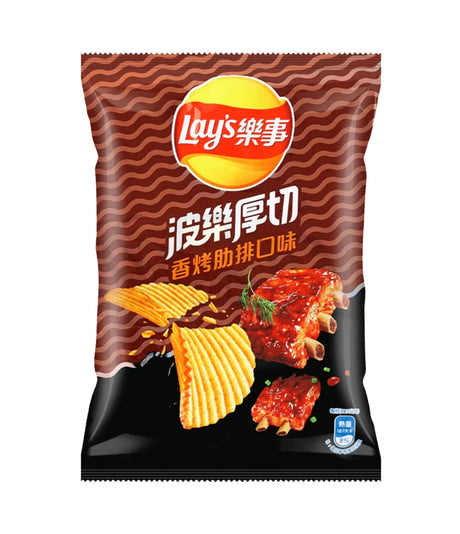A package of Lay's potato chips featuring grilled pork ribs flavor, with images of the chips and pork on the bag, indicating it is a product of Taiwan.