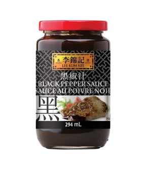 A jar of Lee Kum Kee Black Pepper Sauce with a label showing the product name and an image of a steak covered in the sauce.