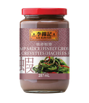 A jar of Lee Kum Kee Shrimp Sauce (Finely Ground) with a label showing the product name and an image of shrimp. The sauce is in a clear jar, and the product is made in China.