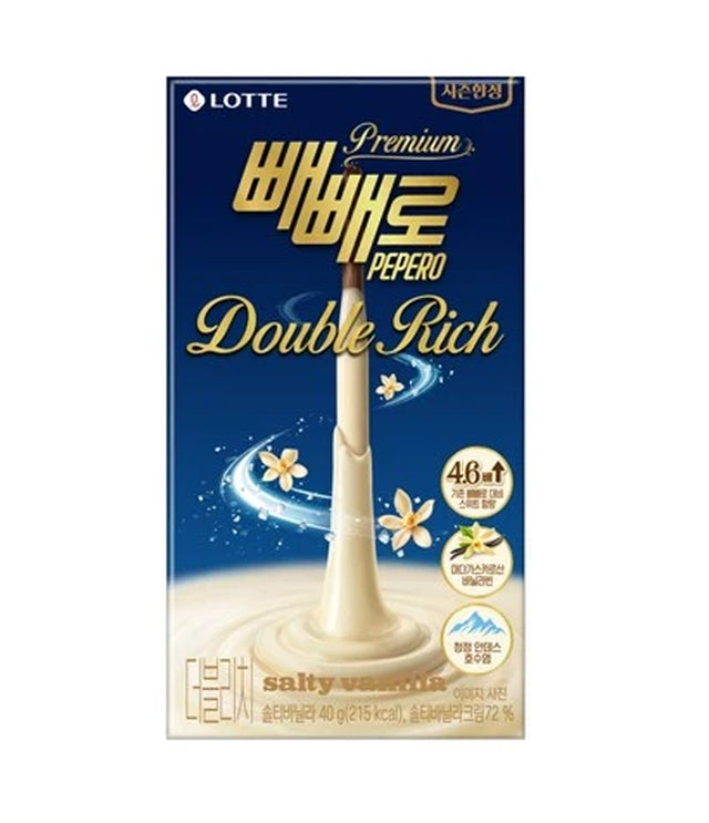 A package of Lotte Premium Pepero Double Rich Salty Vanilla drink mix, featuring a dark blue box with gold lettering and an illustration of creamy vanilla liquid pouring.
