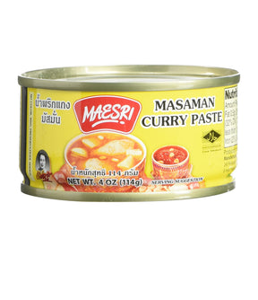 A can of Maesri Masaman Curry Paste, with product information and branding visible.